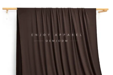 DM09-031 — Modal Spandex Rib Fabric — hanging fabric on wooden bar