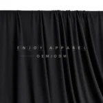 DL0045 — Washed Polyester Spandex Interlock Fabric — hanging fabric on wooden bar
