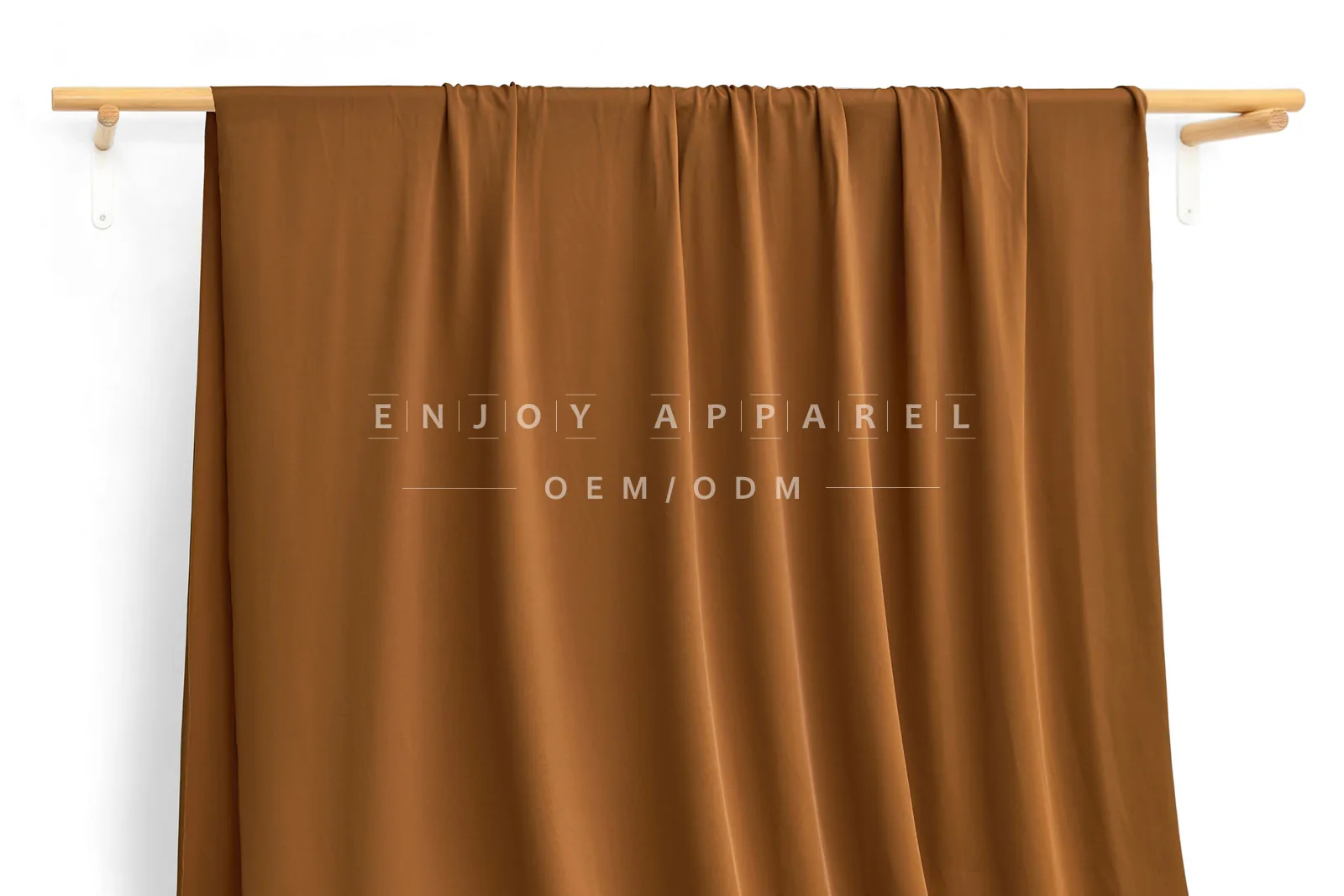 JL02-060 — Matte Nylon Spandex Swim Fabric — hanging fabric on wooden bar
