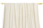 JL0087 — Matte Weft Knit Nylon Spandex Fabric — hanging fabric on wooden bar